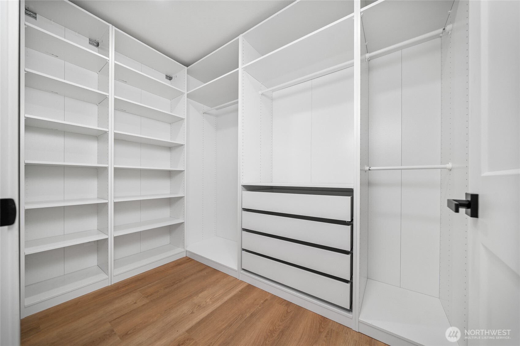 1308 19th Avenue Longview, WA 98632 - Photo 15 of 24 a view of walk in closet with empty racks