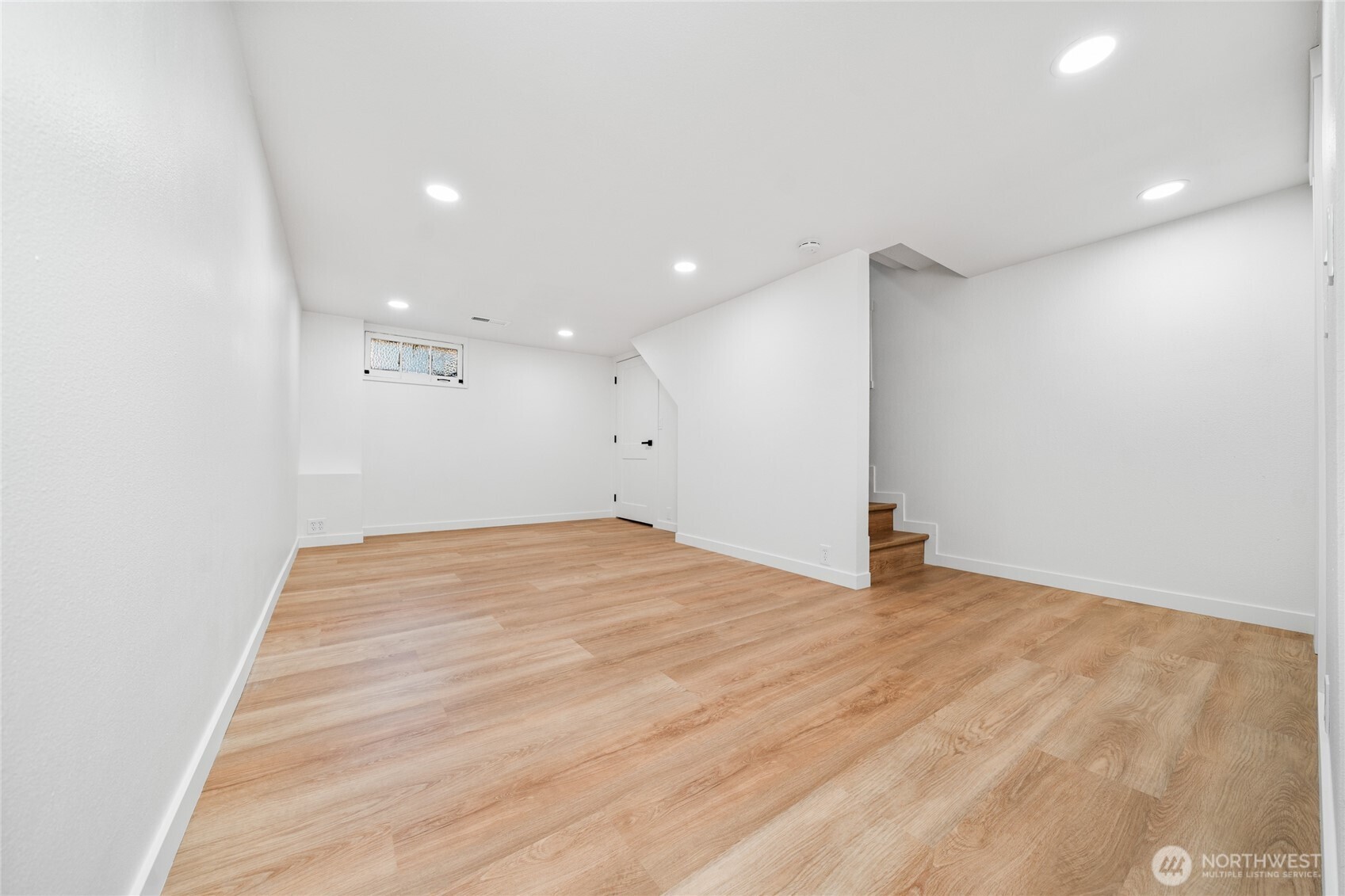 1308 19th Avenue Longview, WA 98632 - Photo 20 of 24 a view of empty room with wooden floor
