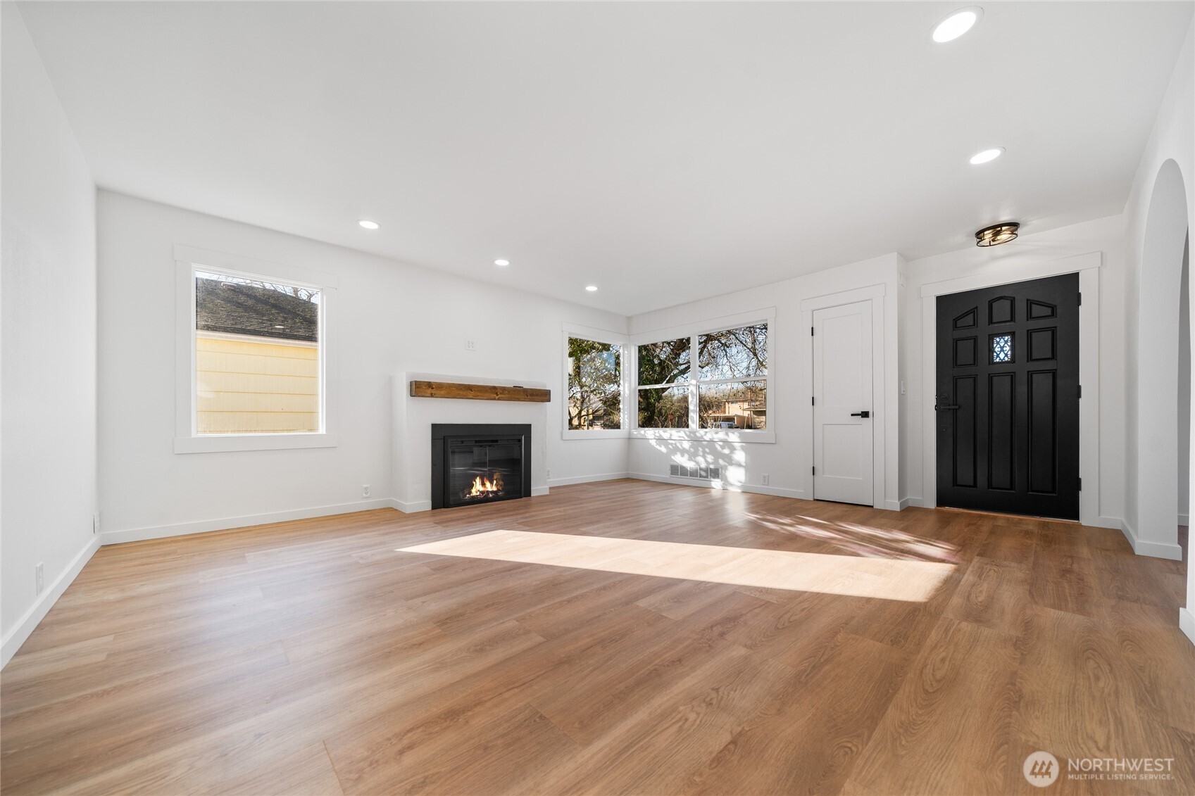 1308 19th Avenue Longview, WA 98632 - Photo 5 of 24 a view of an empty room with window and fire place