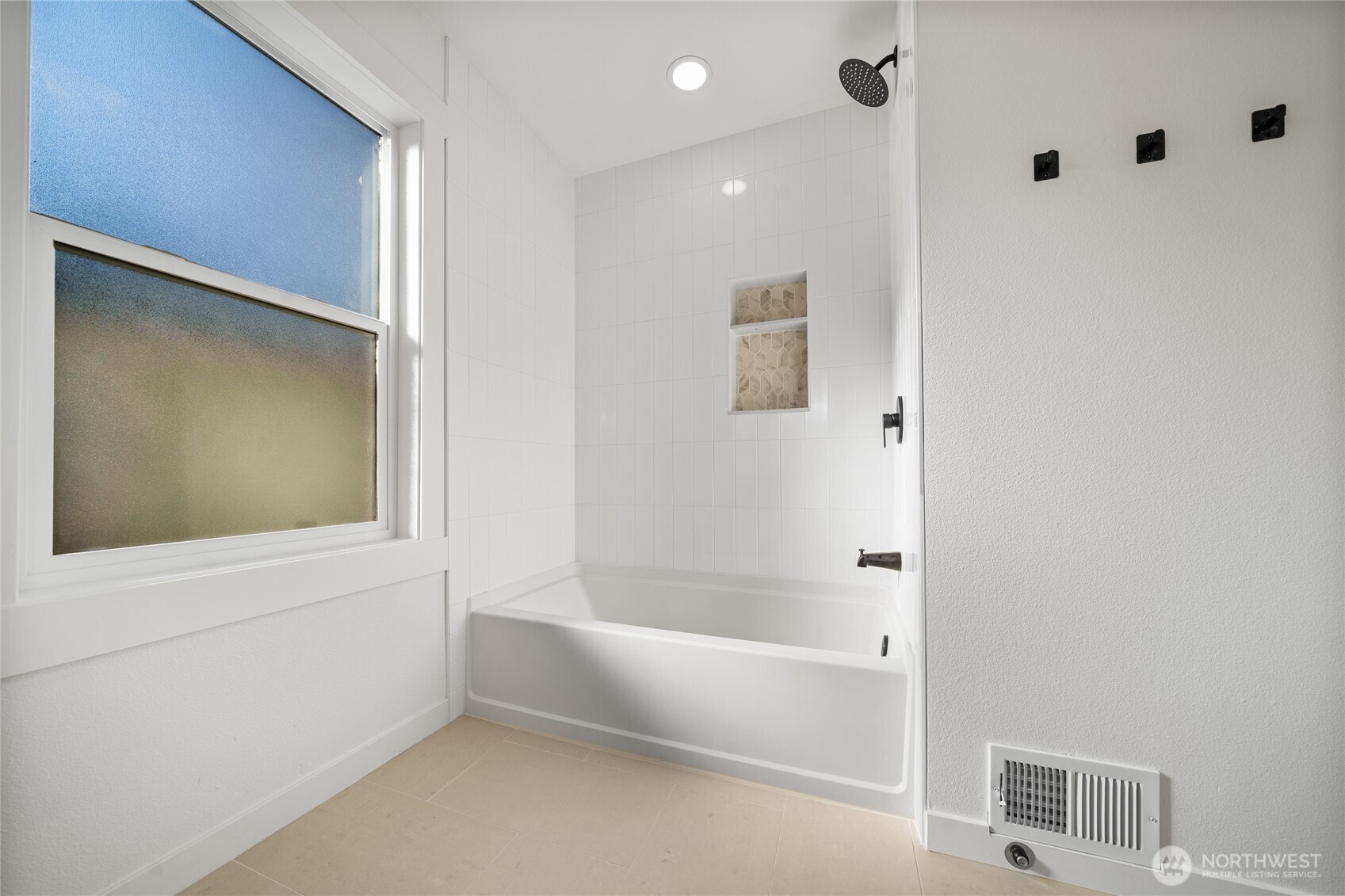 1308 19th Avenue Longview, WA 98632 - Photo 8 of 24 a bathroom with a bathtub and a shower