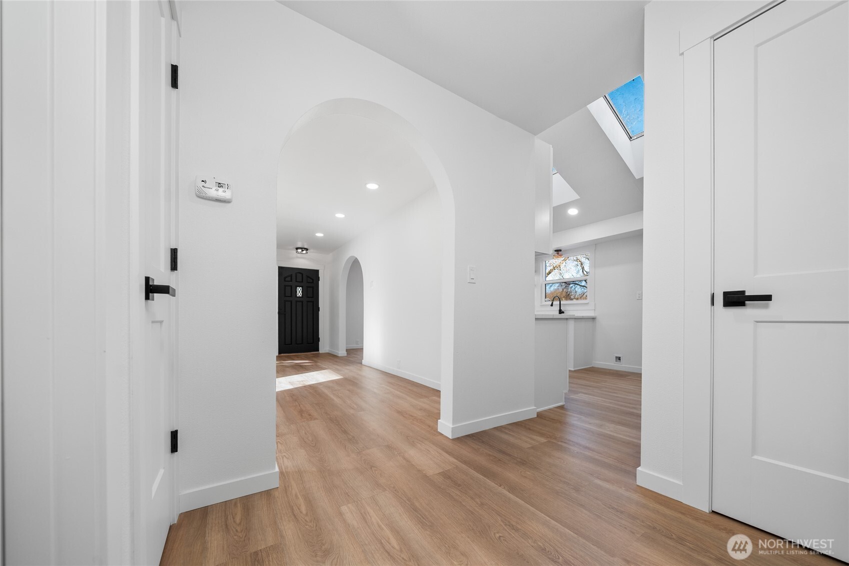 1308 19th Avenue Longview, WA 98632 - Photo 9 of 24 a view of a hallway with wooden floor