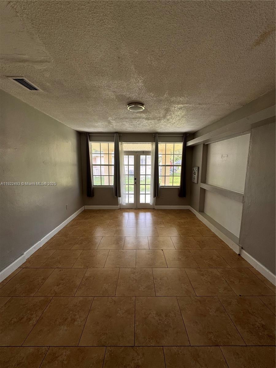 316 Southwest 2nd Terrace Hallandale Beach, FL 33009 - Photo 8 of 16 a view of livingroom with window