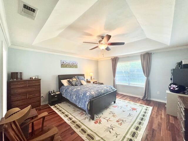 4258 Shadow Lane Niceville, FL 32578 - Photo 18 of 35 a bedroom with a bed and a table in it