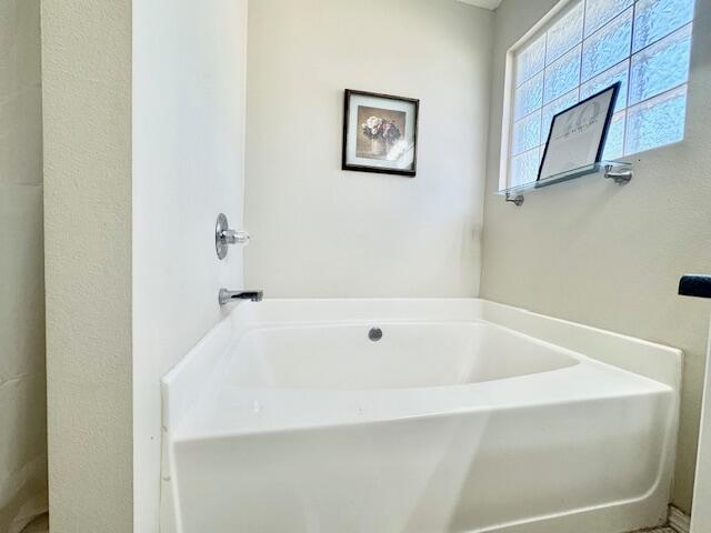 4258 Shadow Lane Niceville, FL 32578 - Photo 24 of 35 a bathroom with a bathtub