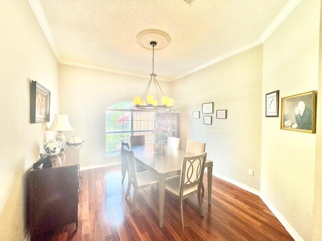 4258 Shadow Lane Niceville, FL 32578 - Photo 6 of 35 a view of a dining room with furniture window and wooden floor