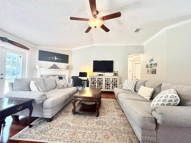 4258 Shadow Lane Niceville, FL 32578 - Photo 10 of 35 a living room with furniture and a flat screen tv