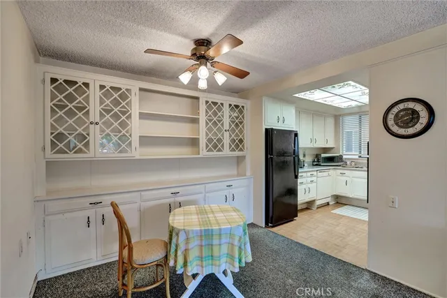 a room with a table and chairs