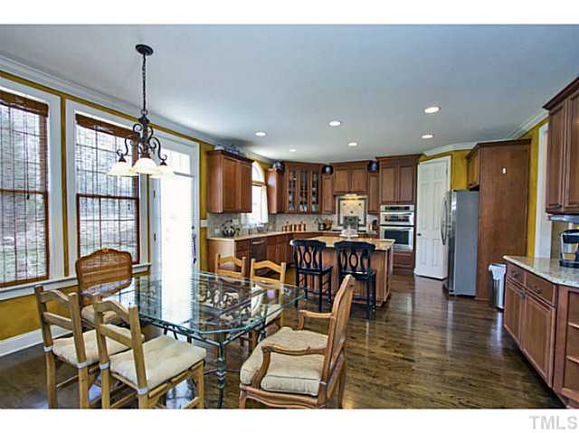 10001 Hidden Vale Drive Raleigh, NC 27614 - Photo 12 of 24 a view of a dining room with furniture