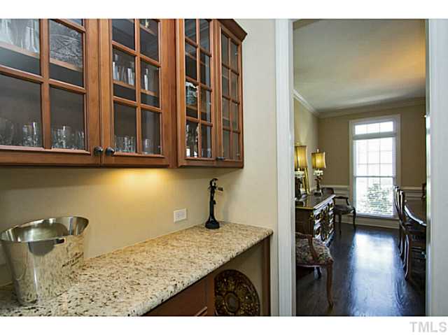 10001 Hidden Vale Drive Raleigh, NC 27614 - Photo 14 of 24 a kitchen with sink and cabinets