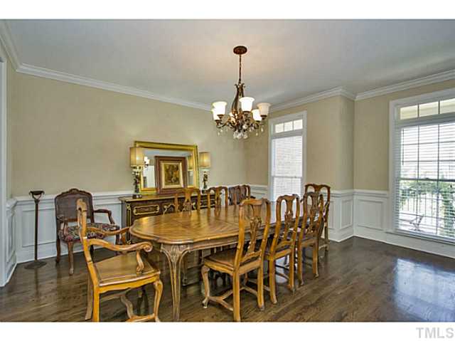10001 Hidden Vale Drive Raleigh, NC 27614 - Photo 7 of 24 a view of a dining room with furniture and wooden floor