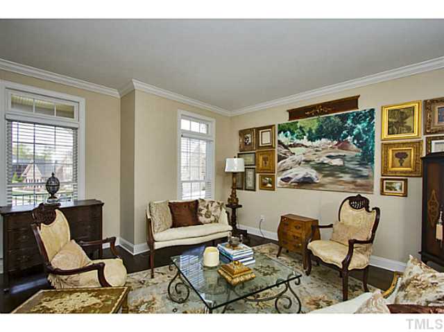 10001 Hidden Vale Drive Raleigh, NC 27614 - Photo 8 of 24 a living room with furniture and a large window