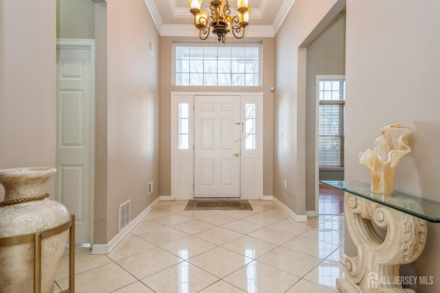 82 Beth Page Drive Monroe Township, NJ 08831 - Photo 2 of 40 a view of a room with windows