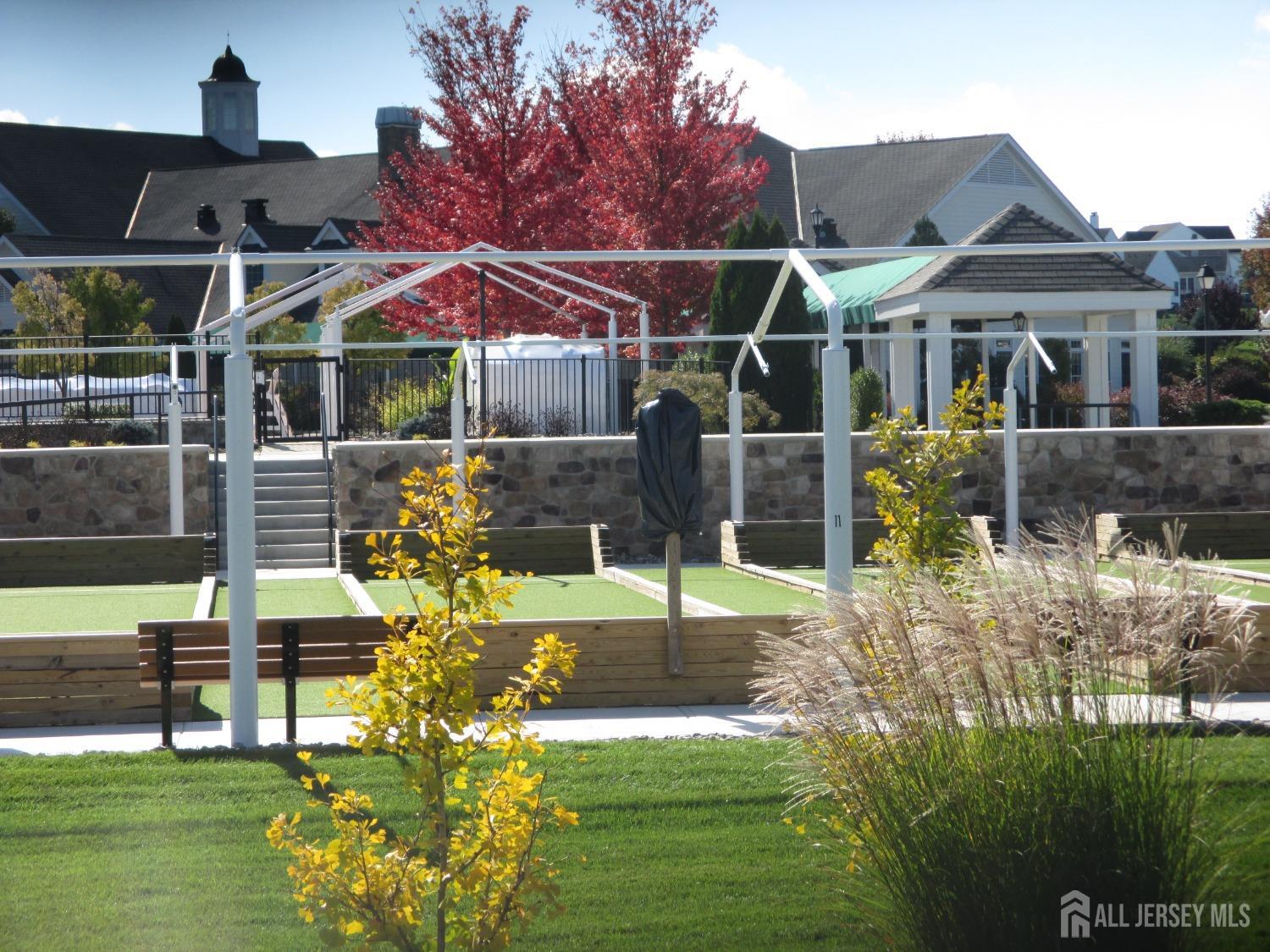 82 Beth Page Drive Monroe Township, NJ 08831 - Photo 30 of 40 a view of a house with a yard