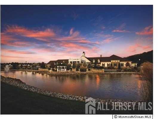 82 Beth Page Drive Monroe Township, NJ 08831 - Photo 40 of 40 a view of a lake with a city