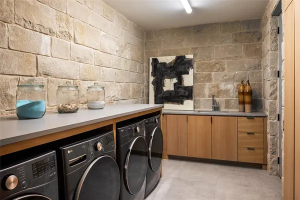 a utility room with cabinets