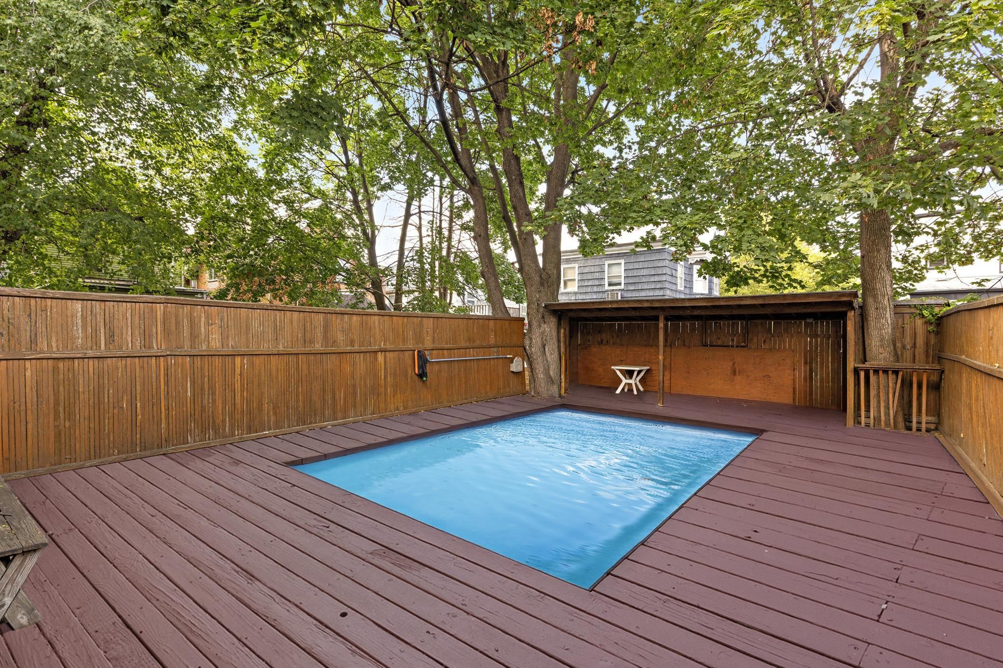 43 West 43rd Street Bayonne, NJ 07002 - Photo 6 of 22 a view of a backyard with wooden floor