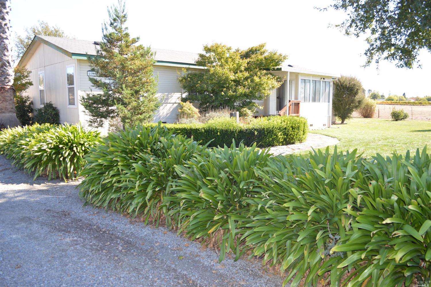 4040 Barnes Road Santa Rosa, CA 95403 - Photo 1 of 1 a view of a garden with a house