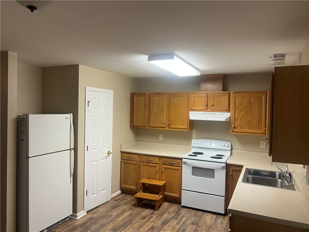 489 Talbert Road McCormick, SC 29835 - Photo 5 of 13 An inviting kitchen space features essential appliances and ample cabinetry for culinary endeavors.