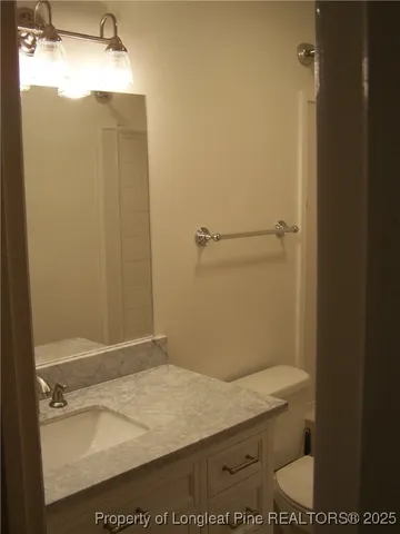 a bathroom with a tub and a sink