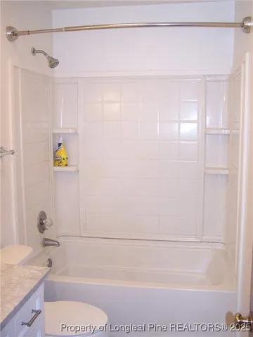 a view of a golf course with a lake