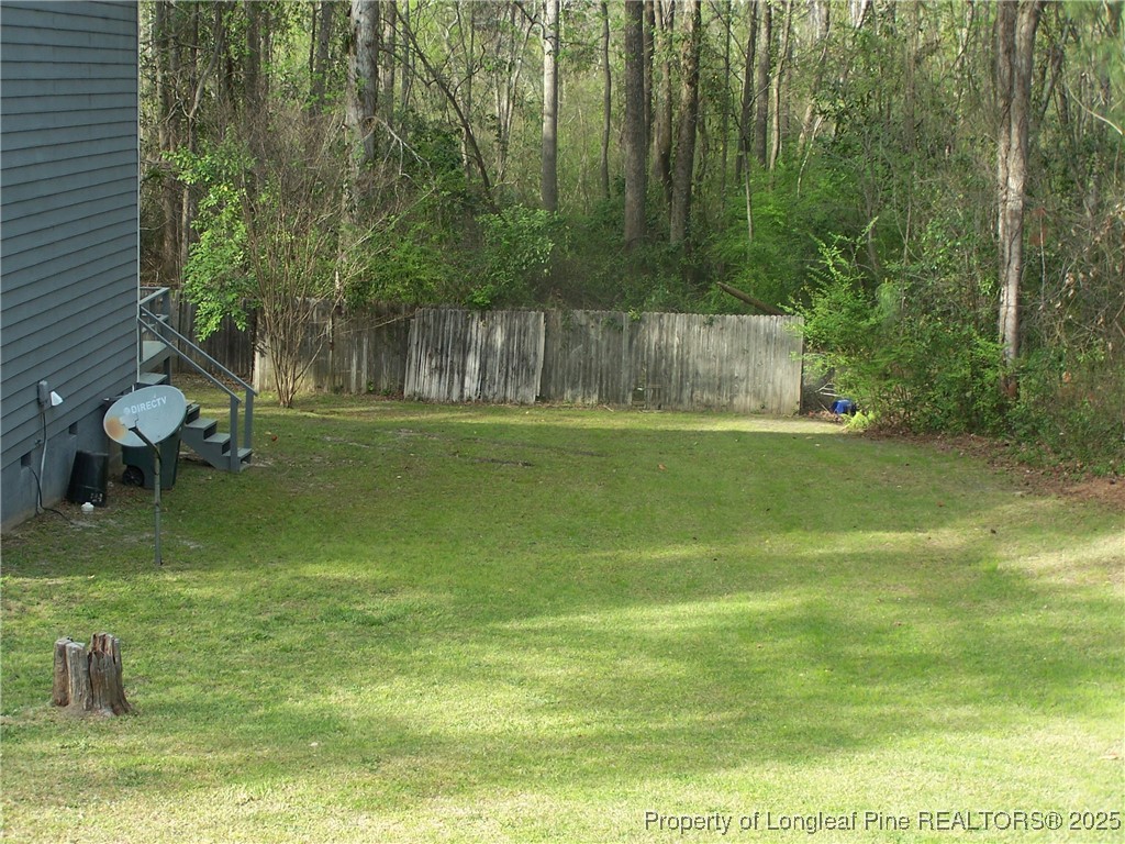 6332 A Marykirk Drive, Unit A Fayetteville, NC 28304 - Photo 16 of 17 a view of a golf course with a lake