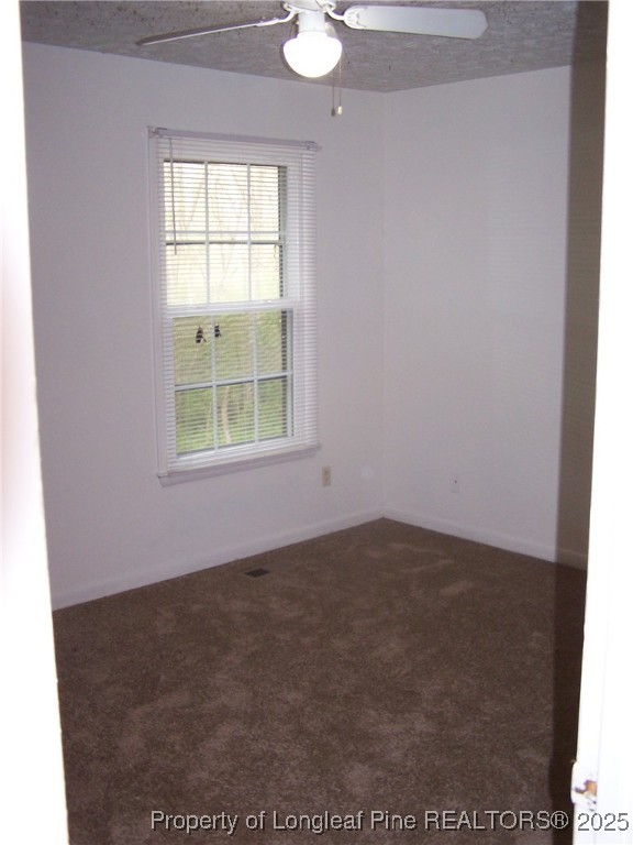 6332 A Marykirk Drive, Unit A Fayetteville, NC 28304 - Photo 10 of 17 an empty room with windows and closet