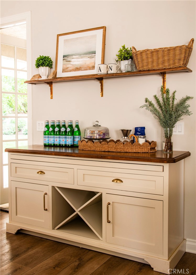 29528 Ridgeway Drive Agoura Hills, CA 91301 - Photo 11 of 41 a kitchen with stainless steel appliances white cabinets and a potted plant