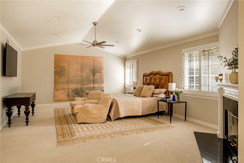 29528 Ridgeway Drive Agoura Hills, CA 91301 - Photo 18 of 41 a bed room with furniture and a window
