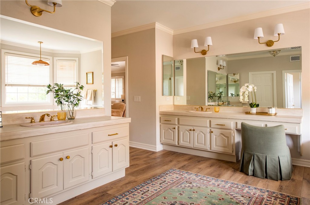 29528 Ridgeway Drive Agoura Hills, CA 91301 - Photo 20 of 41 a spacious bathroom with a double vanity sink and a mirror