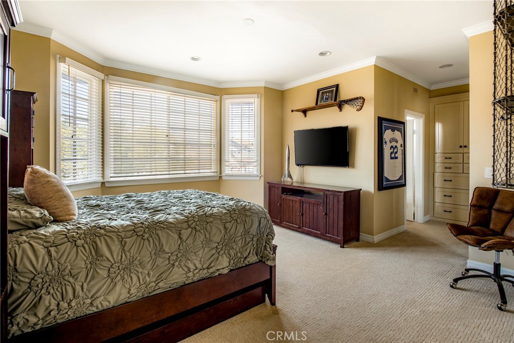 29528 Ridgeway Drive Agoura Hills, CA 91301 - Photo 23 of 41 a living room with furniture and a flat screen tv