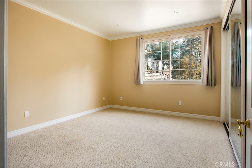 29528 Ridgeway Drive Agoura Hills, CA 91301 - Photo 26 of 41 an empty room with a window