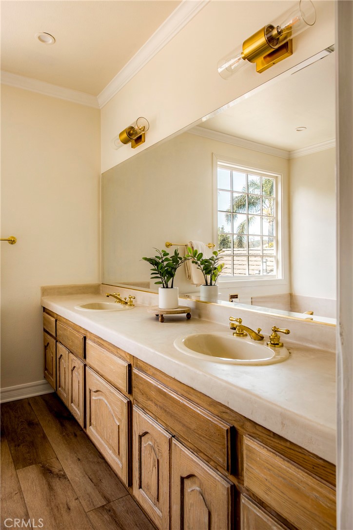 29528 Ridgeway Drive Agoura Hills, CA 91301 - Photo 27 of 41 a bathroom with a sink and a mirror