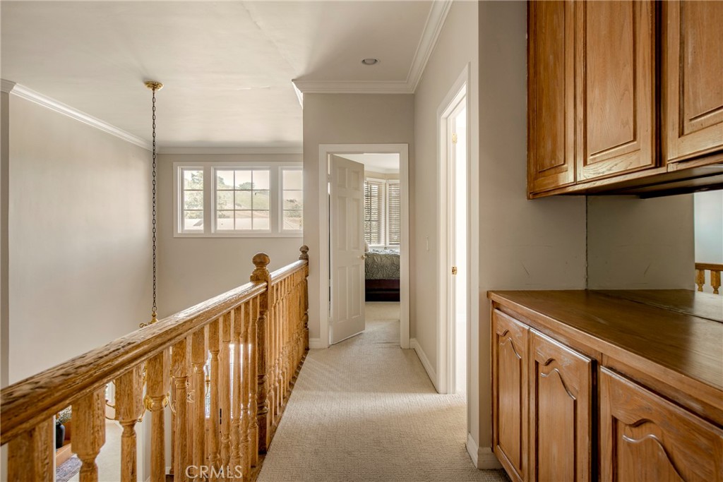 29528 Ridgeway Drive Agoura Hills, CA 91301 - Photo 28 of 41 a view of a hallway with windows