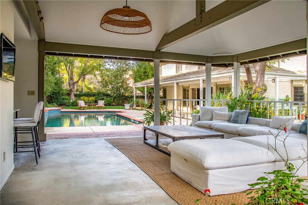 29528 Ridgeway Drive Agoura Hills, CA 91301 - Photo 31 of 41 a living room with furniture and a large window