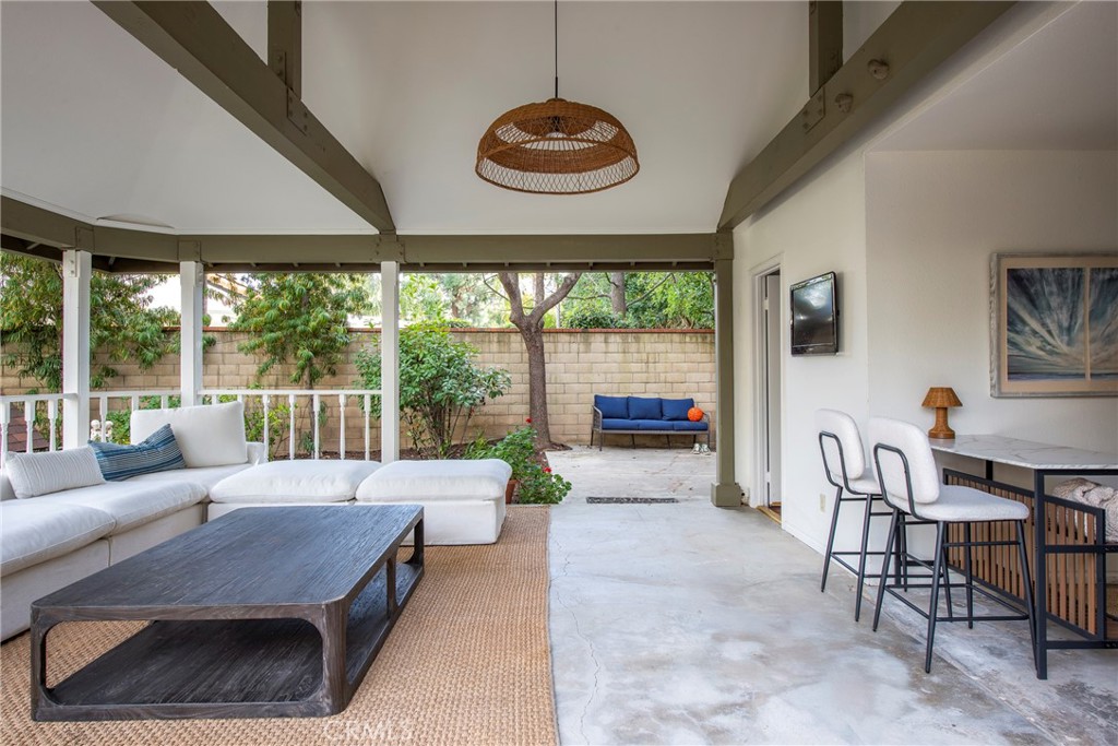 29528 Ridgeway Drive Agoura Hills, CA 91301 - Photo 32 of 41 a living room with furniture and a large window