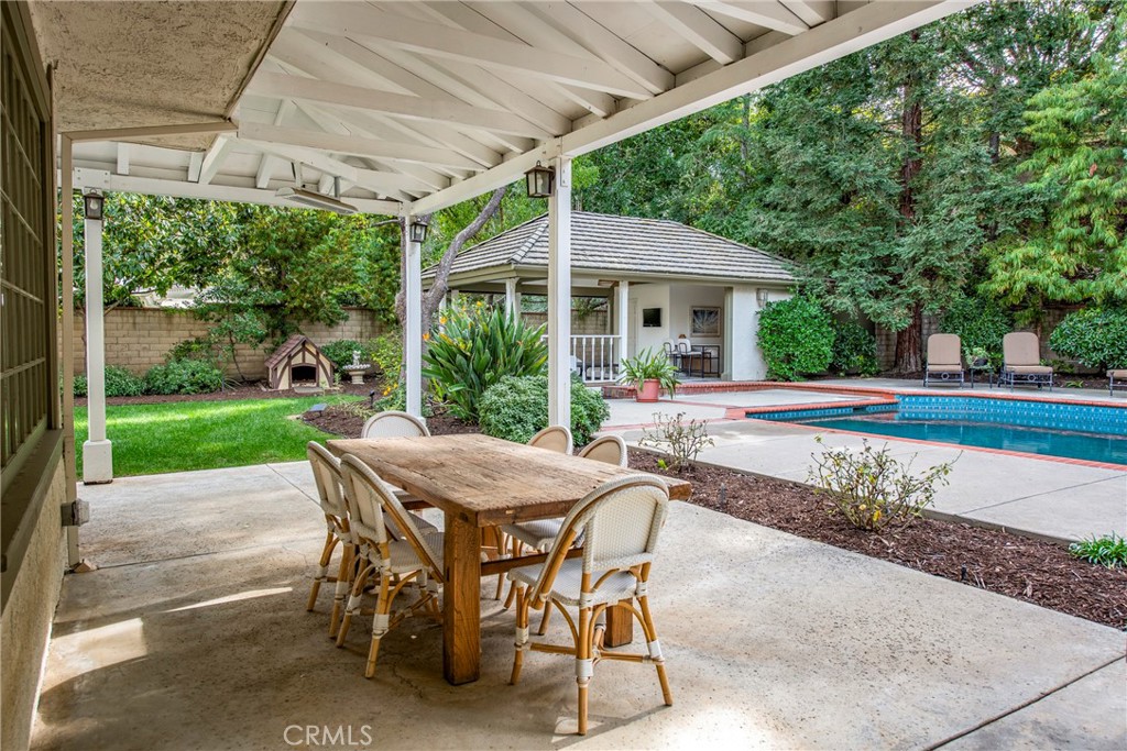 29528 Ridgeway Drive Agoura Hills, CA 91301 - Photo 40 of 41 a patio with yard table and chairs