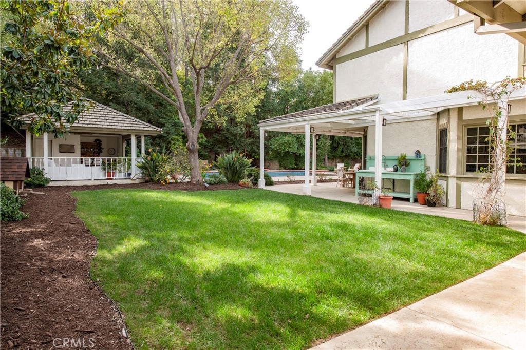 29528 Ridgeway Drive Agoura Hills, CA 91301 - Photo 41 of 41 a view of a house with a yard deck and sitting area