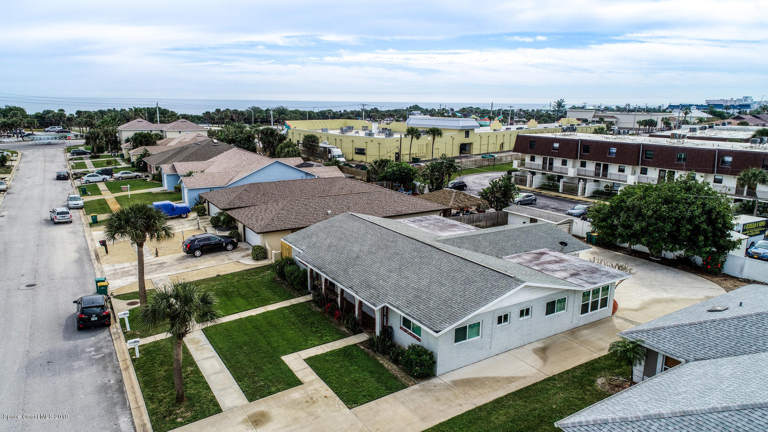 201 Ocean View Lane Melbourne, FL 32903 - Photo 21 of 21 an aerial view of a house with a garden