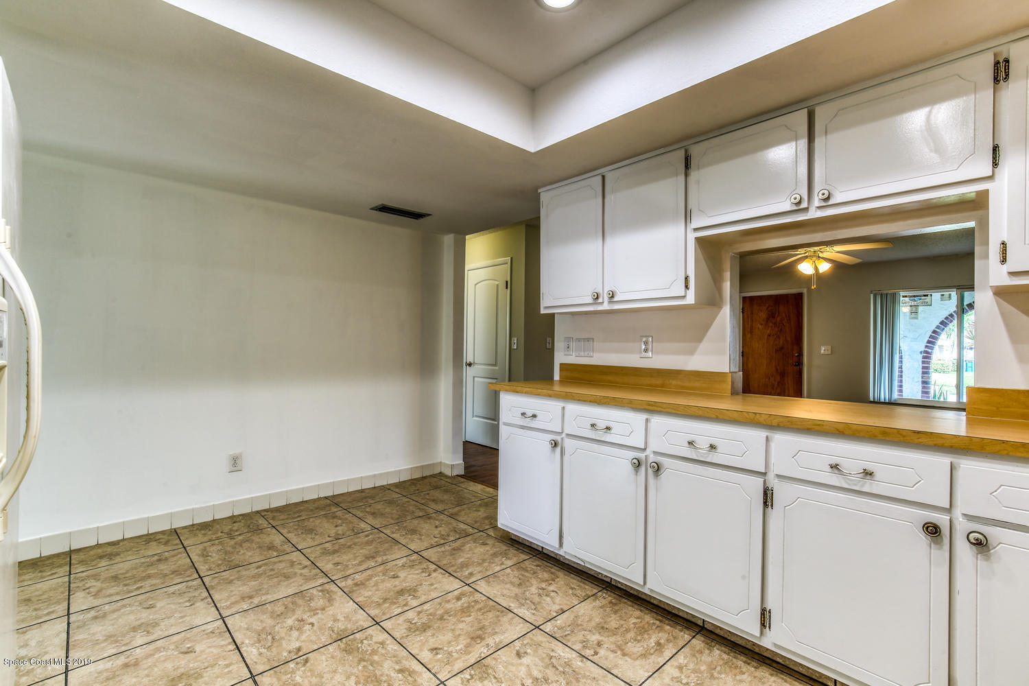 201 Ocean View Lane Melbourne, FL 32903 - Photo 9 of 21 a view of a kitchen with cabinets
