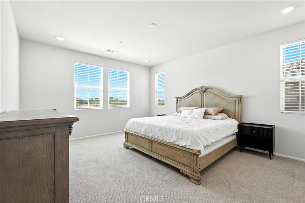 28267 Ashtree Street Temecula, CA 92591 - Photo 25 of 41 a bedroom with a bed and window
