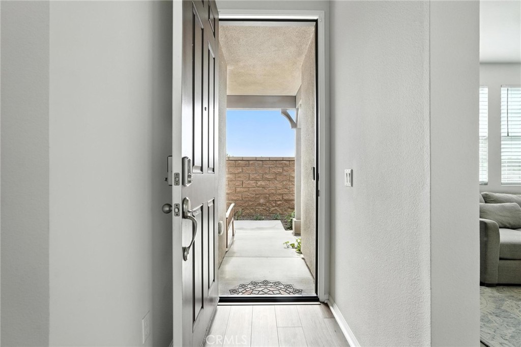 28267 Ashtree Street Temecula, CA 92591 - Photo 4 of 41 a view of a glass door with a glass door
