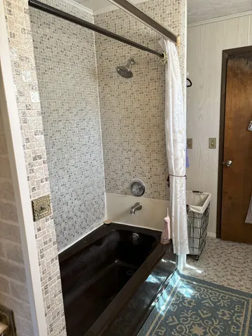 a bathroom with a sink and a shower
