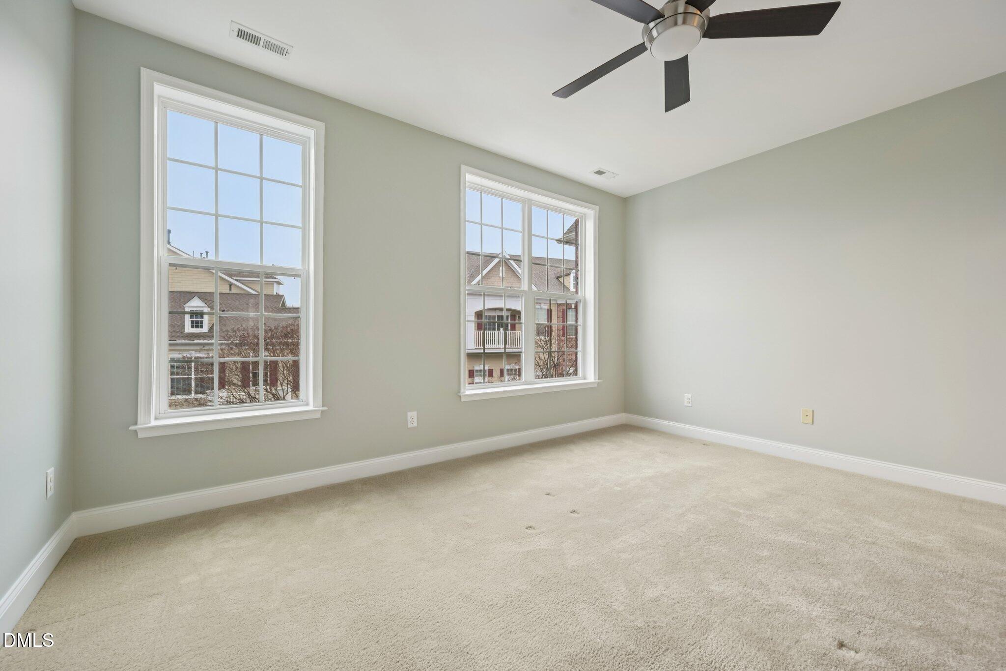 10510 Sablewood Drive, Unit 113 Raleigh, NC 27617 - Photo 21 of 38 a view of an empty room with a window