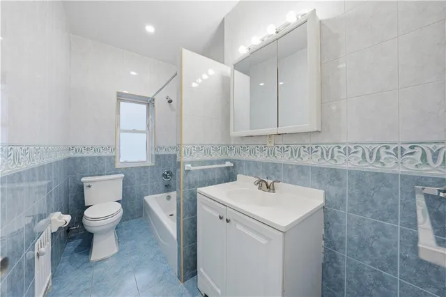 a view of a bathroom with a sink and a toilet