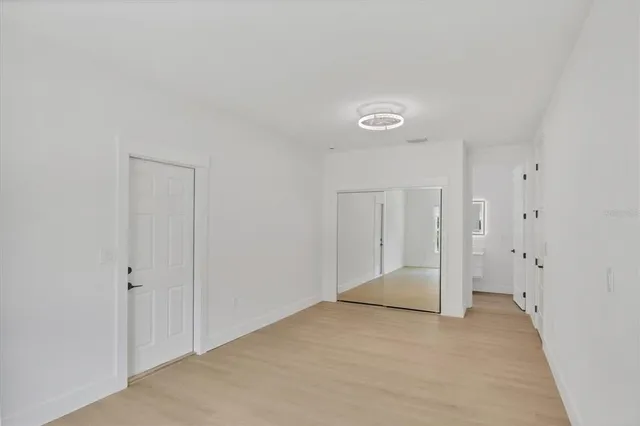 a view of a room that has a window in it