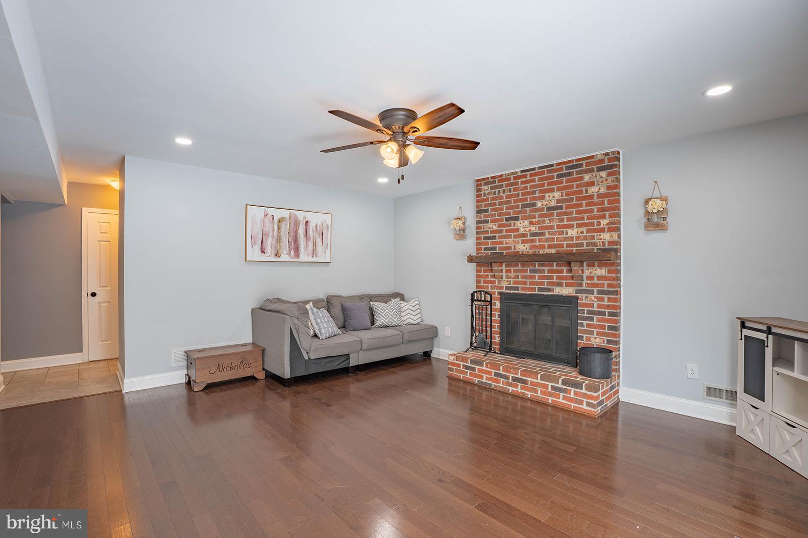 601 Tallowood Lane Mount Laurel, NJ 08054 - Photo 21 of 43 Cozy living space with charming brick fireplace.