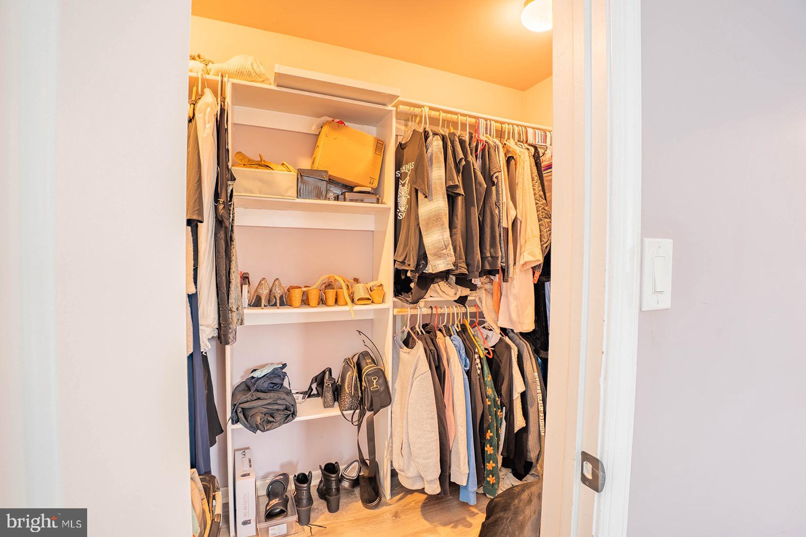 601 Tallowood Lane Mount Laurel, NJ 08054 - Photo 26 of 43 Organized closet with stylish attire.