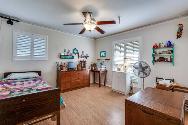 a bedroom with furniture and a bed