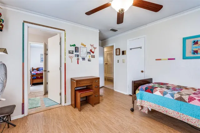 a bathroom with a sink toilet vanity and tub
