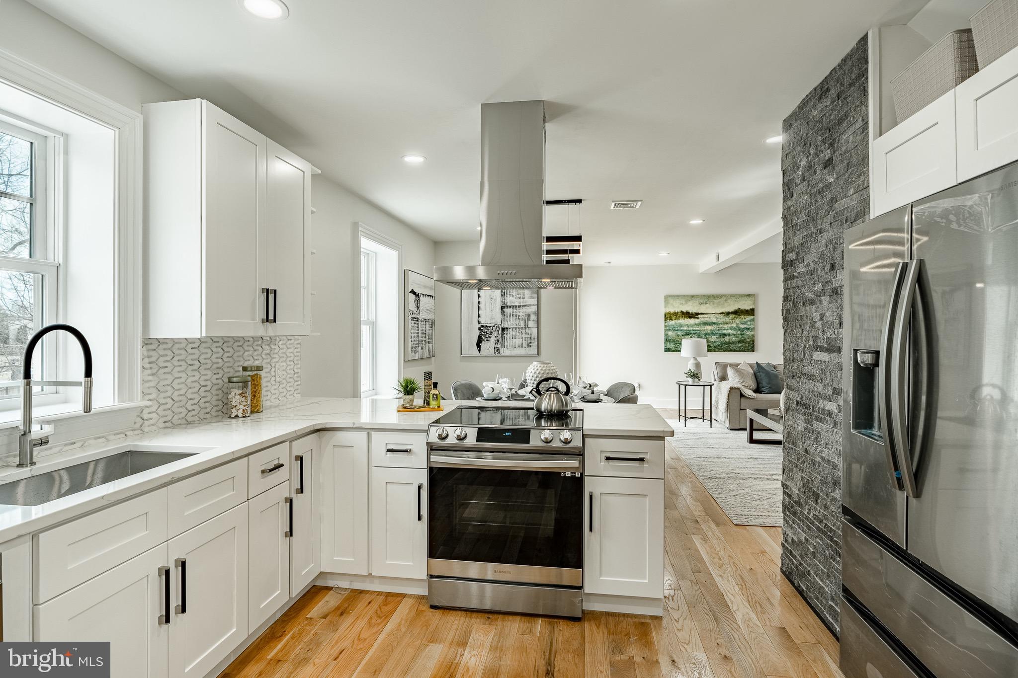 370 Boot Road West Chester, PA 19380 - Photo 12 of 56 a kitchen with stainless steel appliances a stove sink and refrigerator